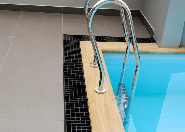 Poolside FRP grating drain