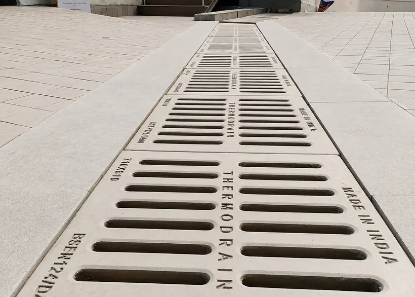Water gully cover on a walkway